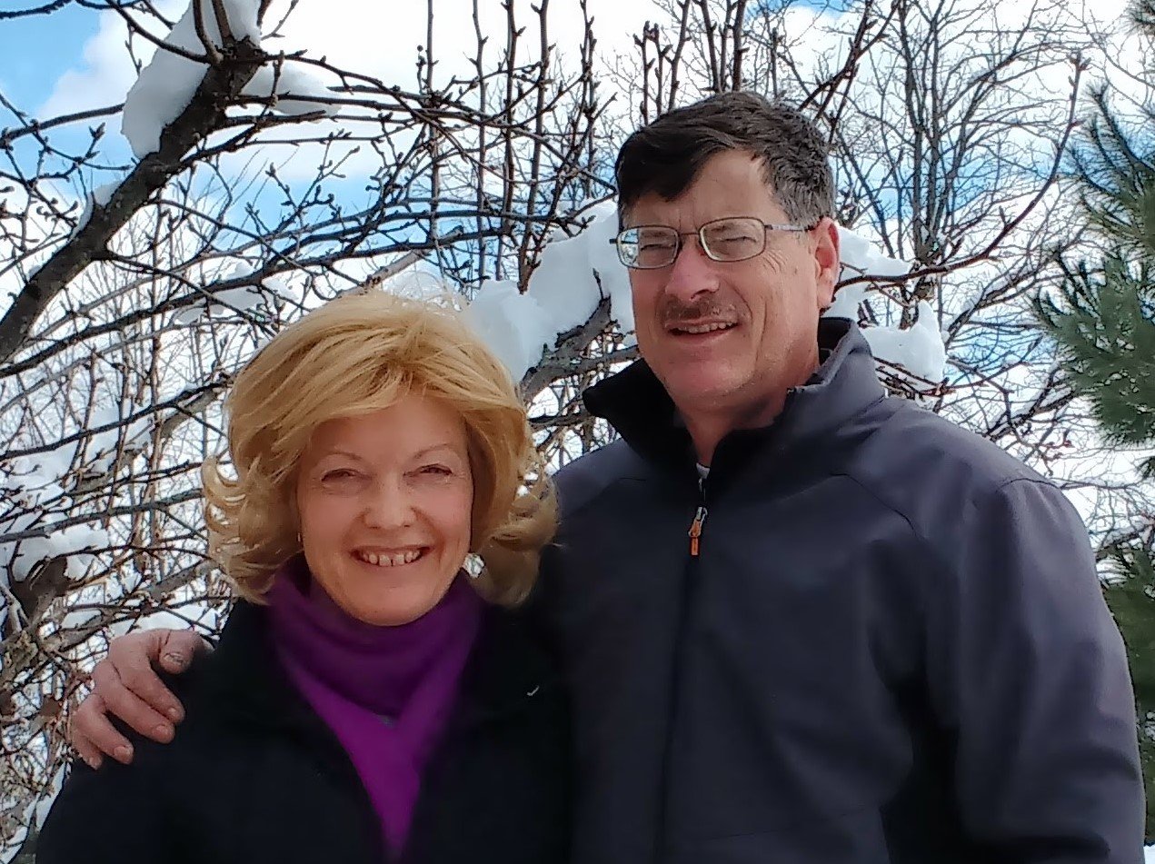 Tone and Neil, founders of New in America, standing together outdoors on a snowy day